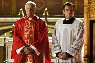 Serious men in serious dresses.