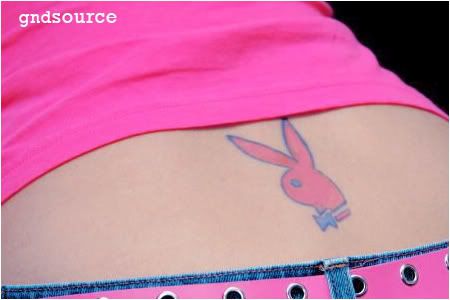 Yesterday she got her Playboy Bunny tattoo removed from her lower back.